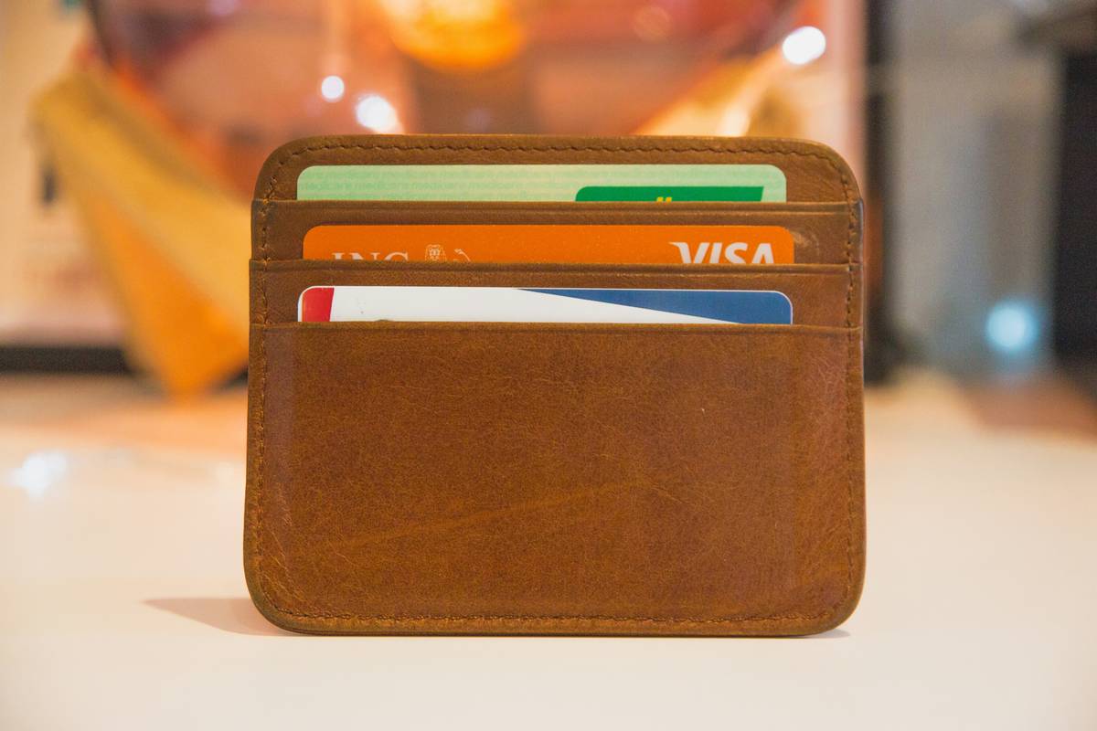 Infographic showing how to pay off credit card debt fast with interest comparison charts